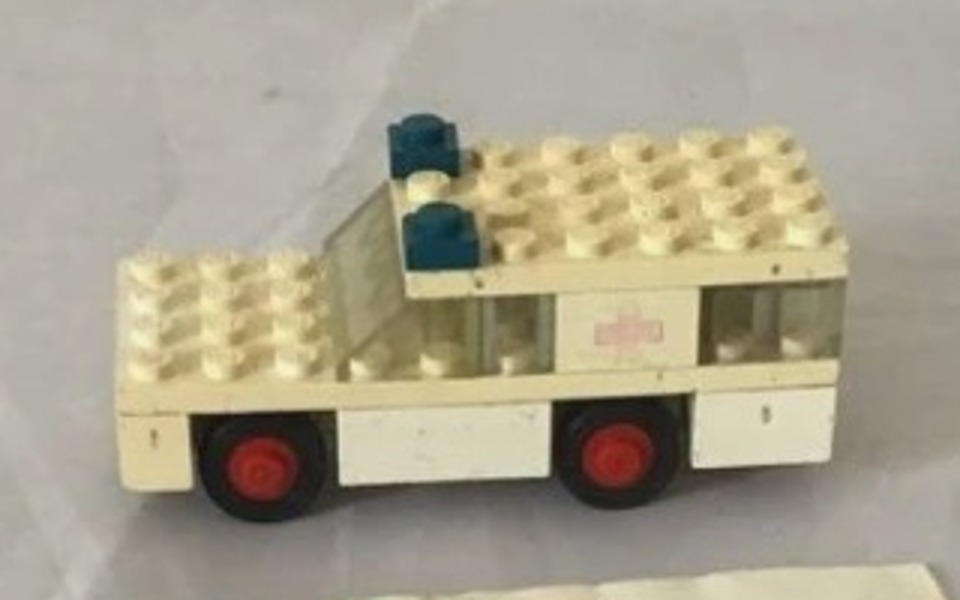The original vintage brick ambulance: cream bricks, red wheels, blue roof lights